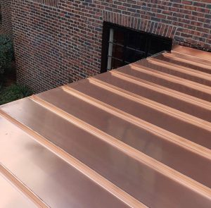 Copper standing seam roof on residential home in Jacksonville, Florida