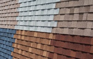 Asphalt shingle roofing installed on a Florida home with clear blue sky background