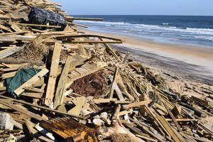 Hurricane Matthew 2016 damage to a residential roof illustrating why it’s vital to know how to protect your roof from a hurricane