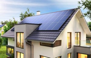 Modern luxury home with metal gable roof and solar panels installed