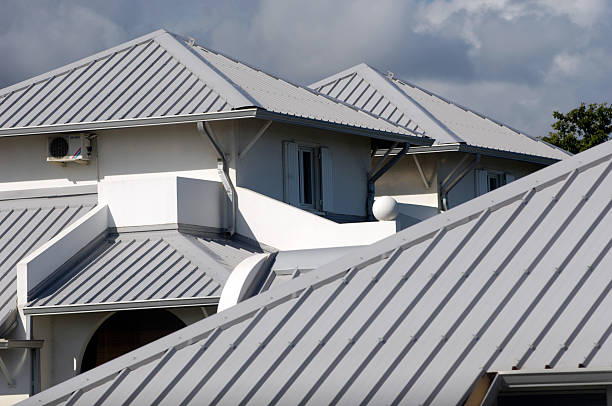 Modern standing seam and metal tile roofing styles showing sleek, durable finishes—top reasons to consider a metal roof in Florida.