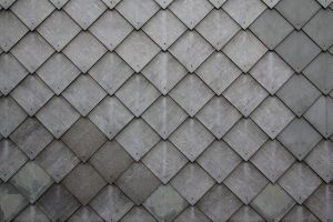 Natural slate tile shingles in staggered rows – a premium roofing type