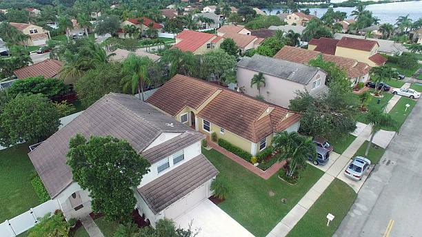 Aerial view of suburban homes showcasing various Northeast Florida roof styles