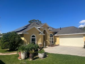 Original asphalt shingle roof before metal roof replacement in Orange Park Florida