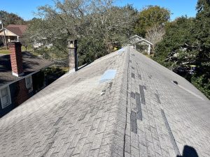 Old worn asphalt shingle roof before replacement in Downtown Jacksonville FL residential roofing project
