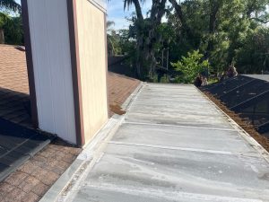 Finished residential roof replacement featuring Owens Corning Duration architectural shingles in Amber.