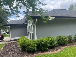 Completed architectural shingle roof replacement featuring Owens Corning Duration in Onyx Black.