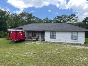 Completed roof replacement in Westside Jacksonville FL featuring Owens Corning Duration shingles in Williamsburg Gray by Prime Roofing.